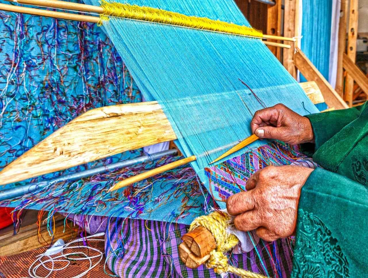Optimal design of an Indian carpet weaving loom structure